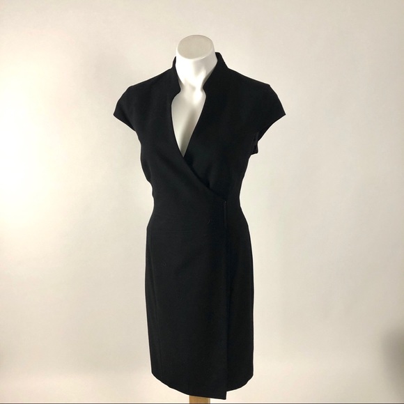Calvin Klein Dresses & Skirts - Calvin Klein black crepe wrap dress with deep V